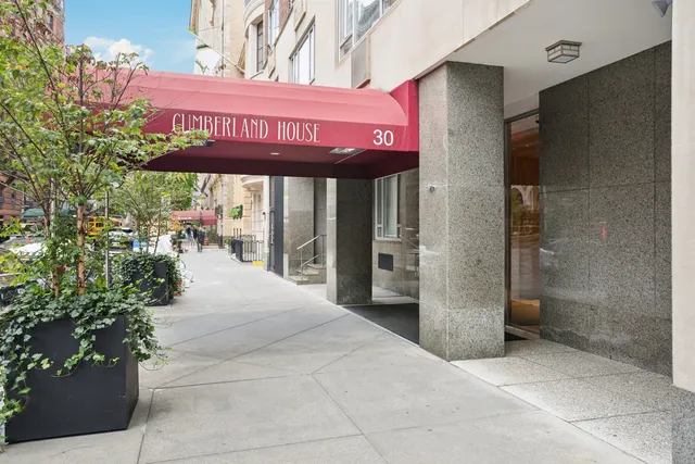 a view of game room with window and couch