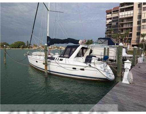 9525 Blind Pass Road, Unit 32 St. Pete Beach, FL 33706 - Photo 1 of 1 Exterior Front - Deep Water Slip Can Accomodate a 55 Boat
