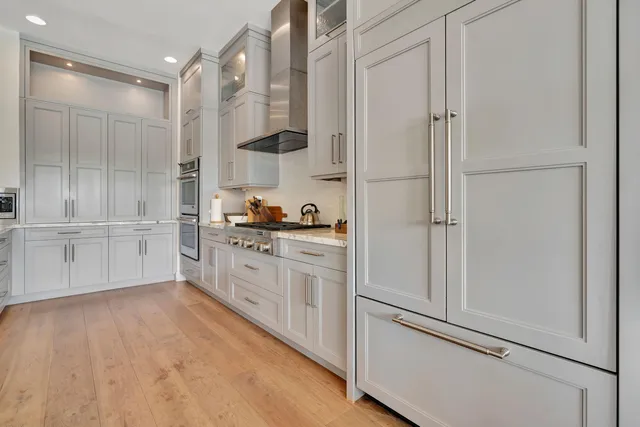 a kitchen with sink cabinets and window