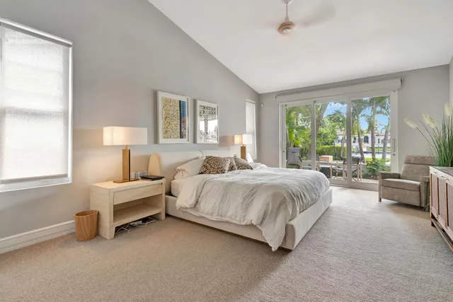 a bathroom with a sink a granite counter and a mirror