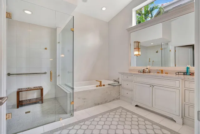 a bathroom with a bathtub and a sink
