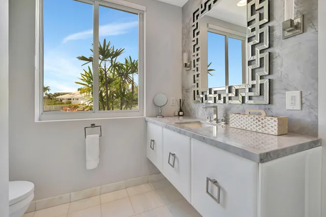 a view of a lake with a house in the background