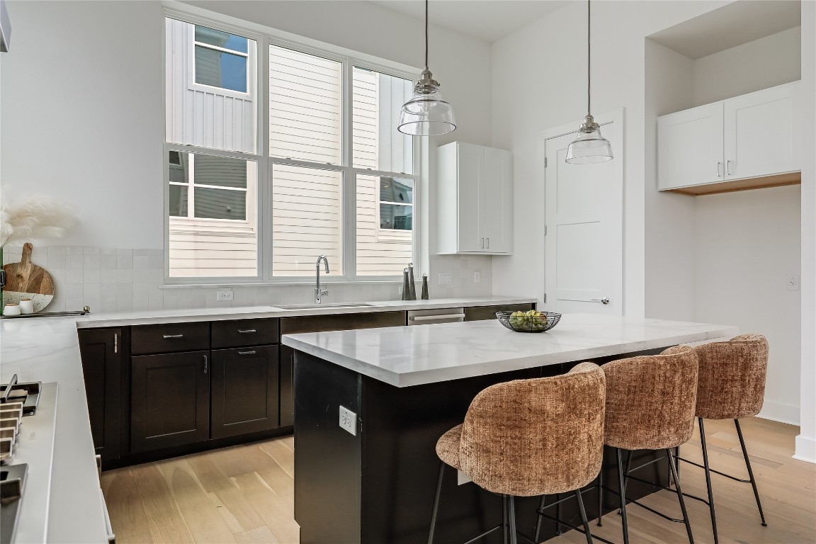 2805 McCurdy Street, Unit 19 Austin, TX 78723 - Photo 11 of 39 Custom cabinetry provides bountiful storage in addition to the pantry.