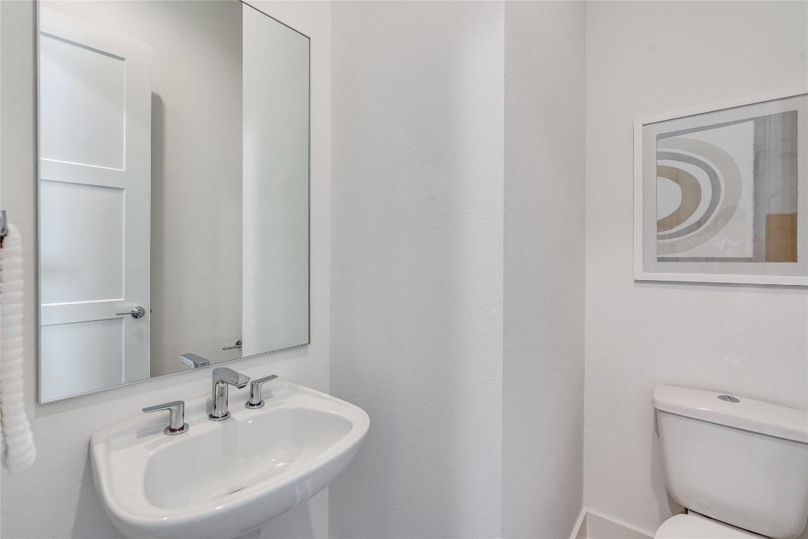 2805 McCurdy Street, Unit 19 Austin, TX 78723 - Photo 14 of 39 The main floor guest powder room.