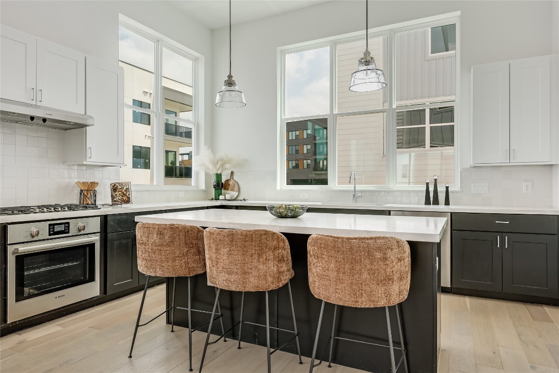2805 McCurdy Street, Unit 19 Austin, TX 78723 - Photo 2 of 39 The gourmet island kitchen is a true showpiece with desirable modern finishes that are sure to impress.