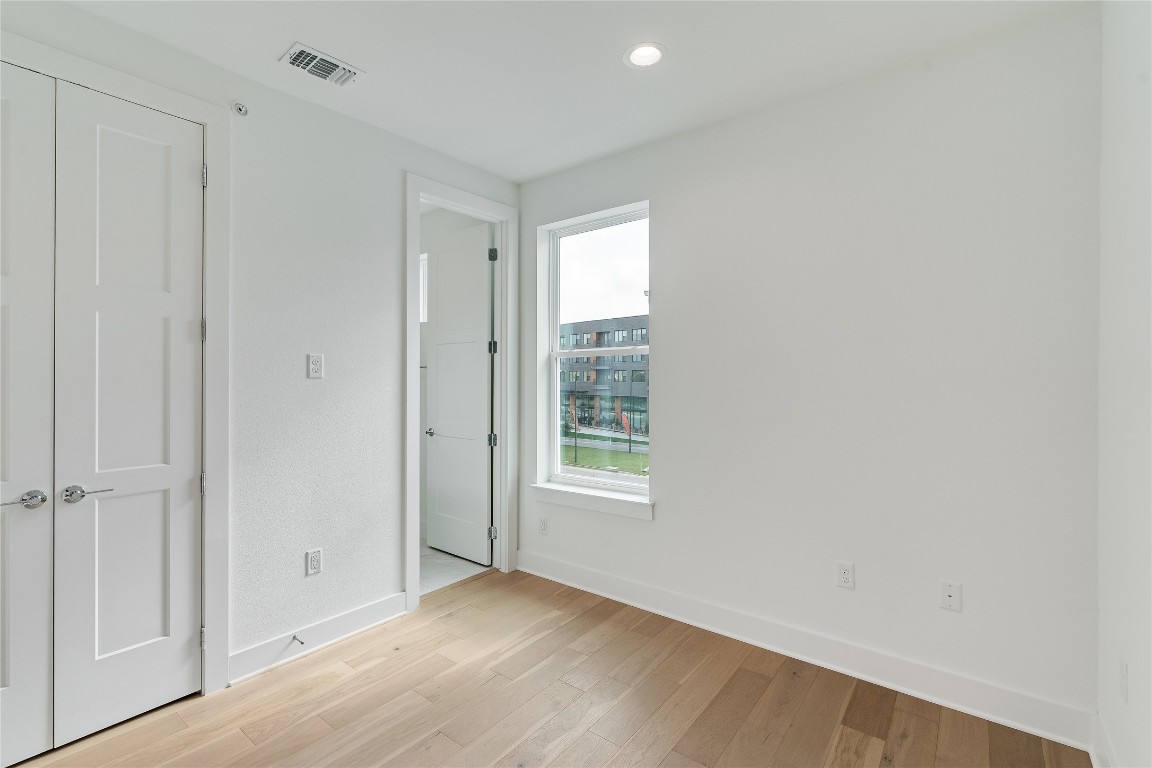 2805 McCurdy Street, Unit 19 Austin, TX 78723 - Photo 20 of 39 Upstairs on the third level you will also find a secondary bedroom with its own ensuite bathroom.