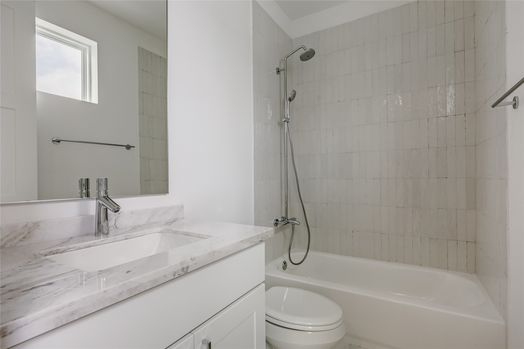 2805 McCurdy Street, Unit 19 Austin, TX 78723 - Photo 21 of 39 a bathroom with a granite countertop sink toilet and shower