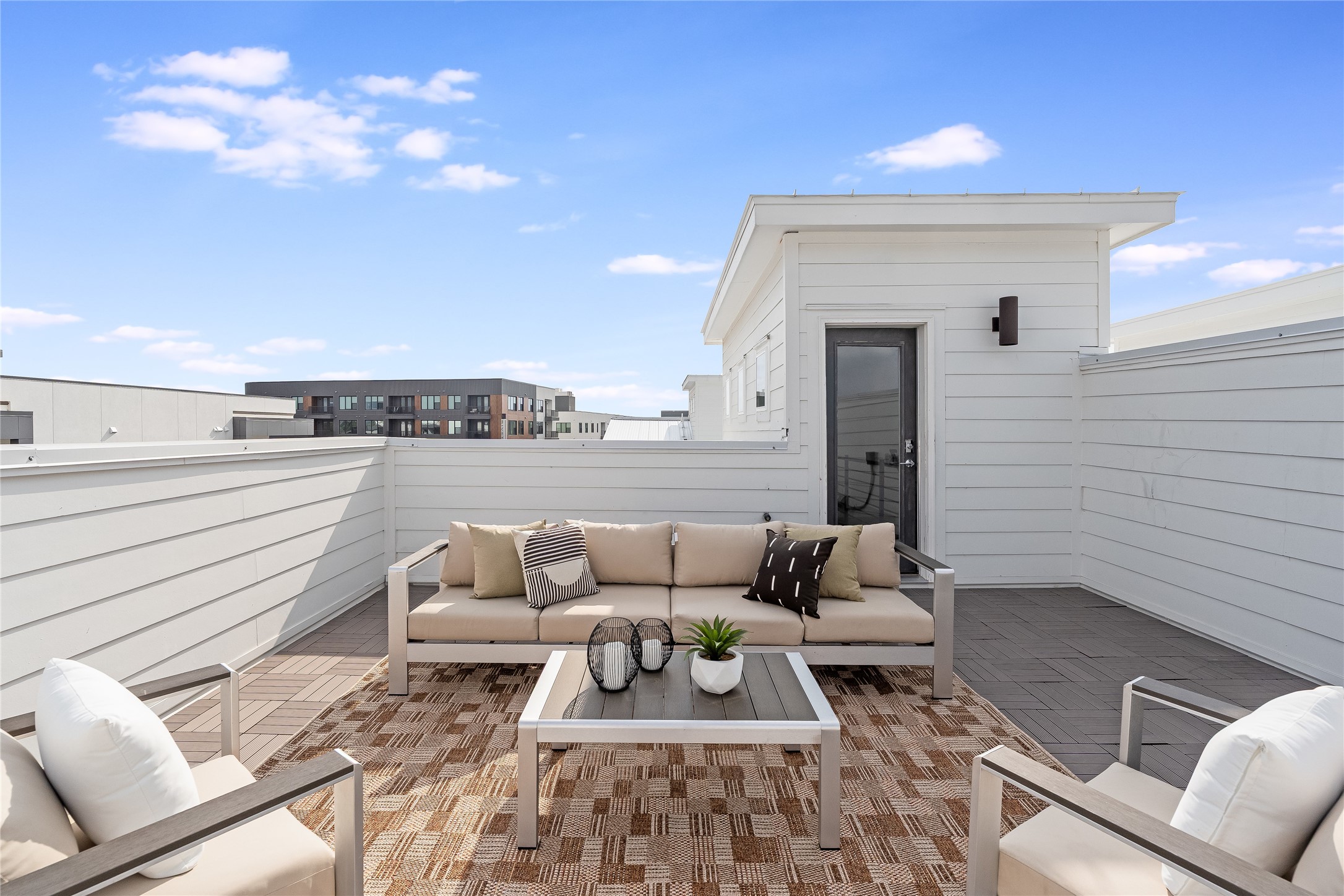2805 McCurdy Street, Unit 19 Austin, TX 78723 - Photo 23 of 39 a view of a patio with couches and potted plants