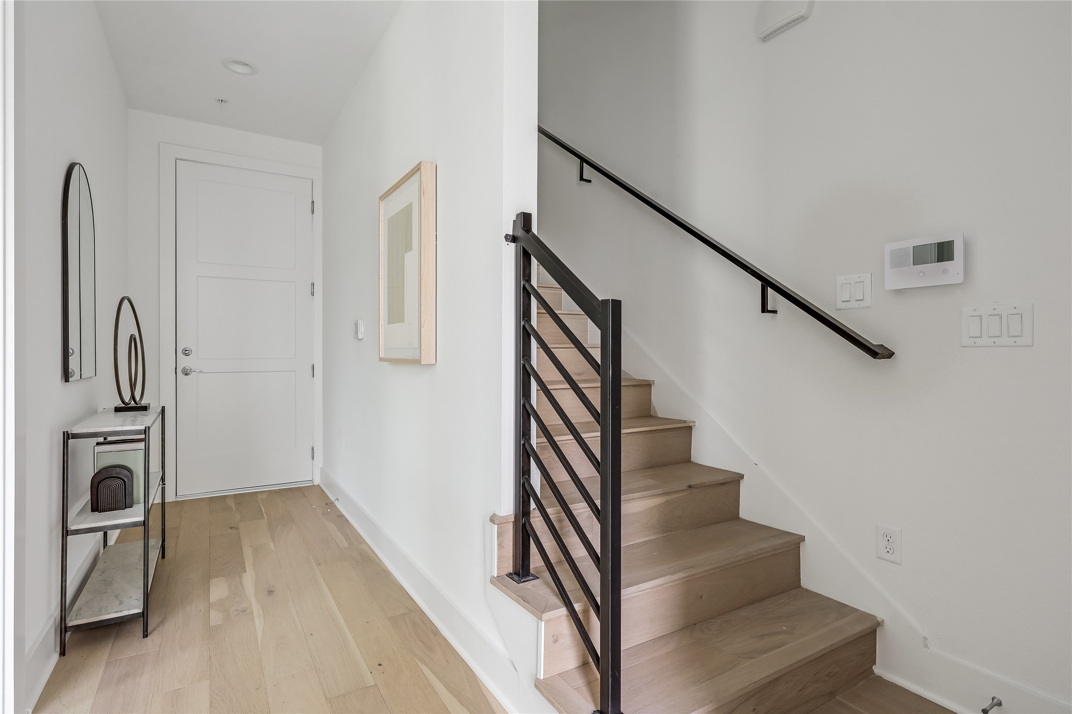 2805 McCurdy Street, Unit 19 Austin, TX 78723 - Photo 25 of 39 a view of a livingroom with wooden floor and stairs