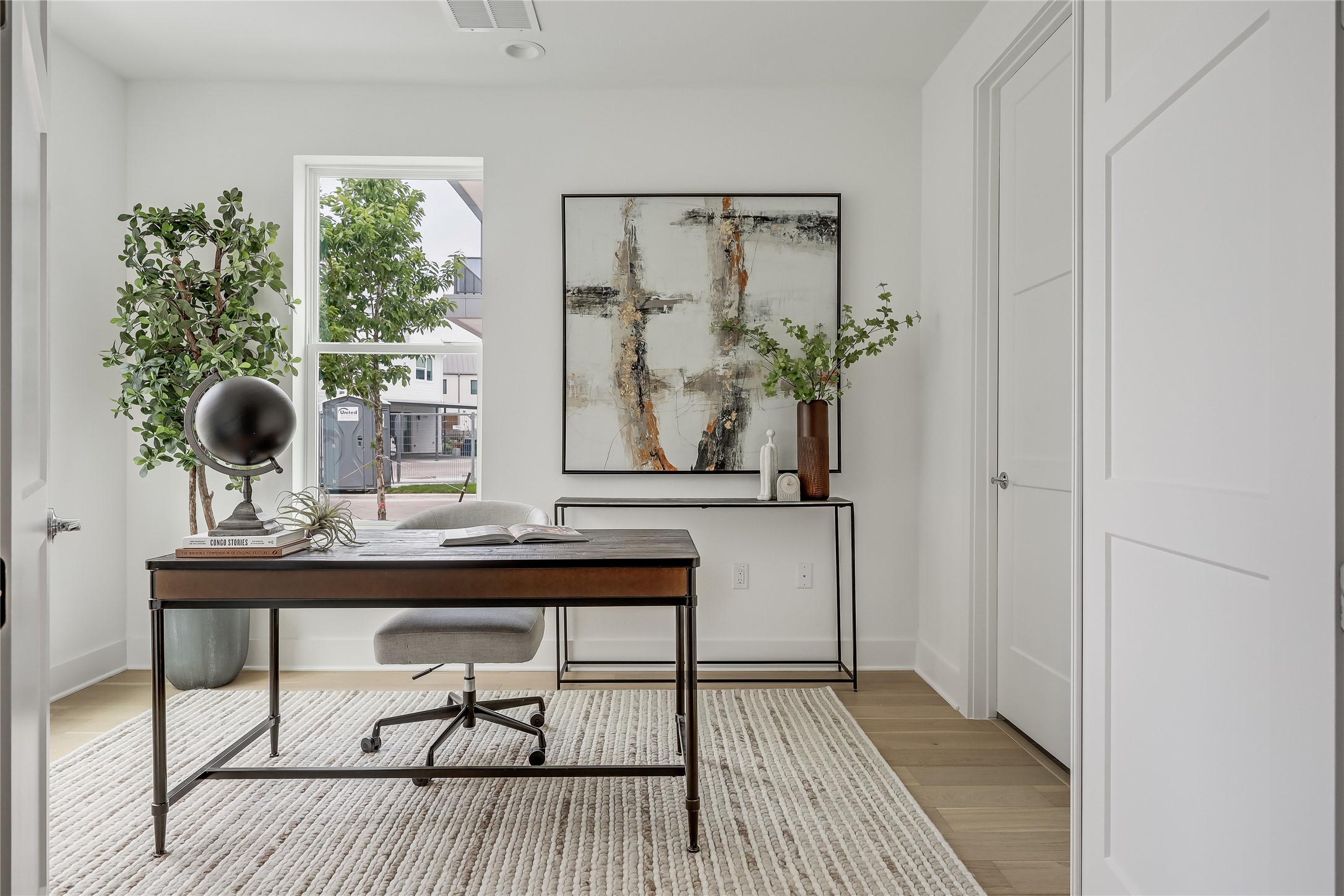 2805 McCurdy Street, Unit 19 Austin, TX 78723 - Photo 26 of 39 a view of a workspace with furniture and window