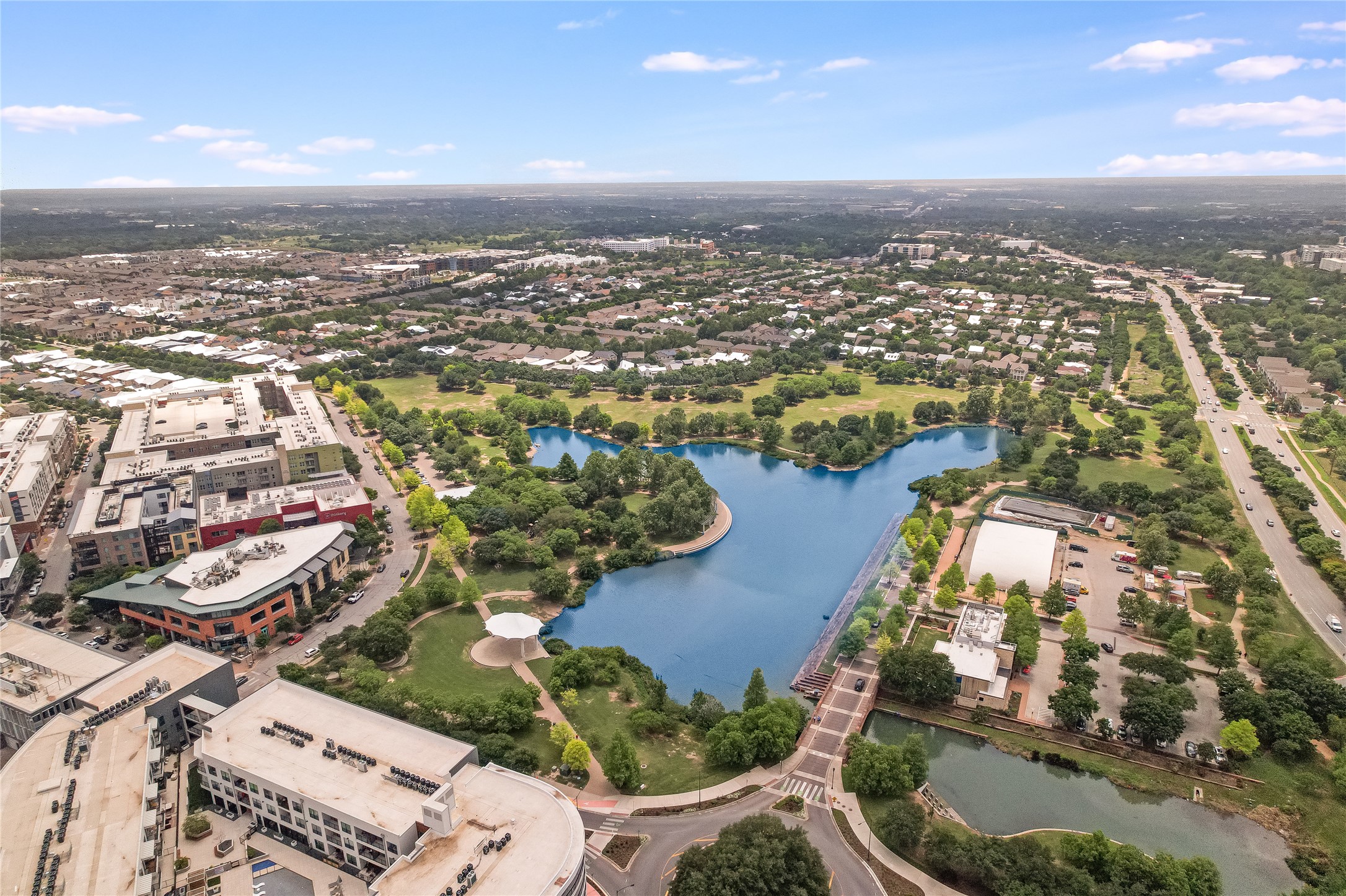 2805 McCurdy Street, Unit 19 Austin, TX 78723 - Photo 35 of 39 an aerial view of residential building and lake
