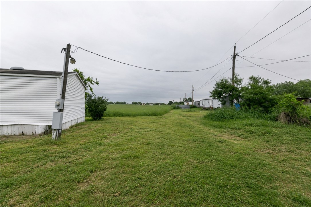 240 Ranger Drive Sandia, TX 78383 - Photo 12 of 12 a view of a big yard with potted plants