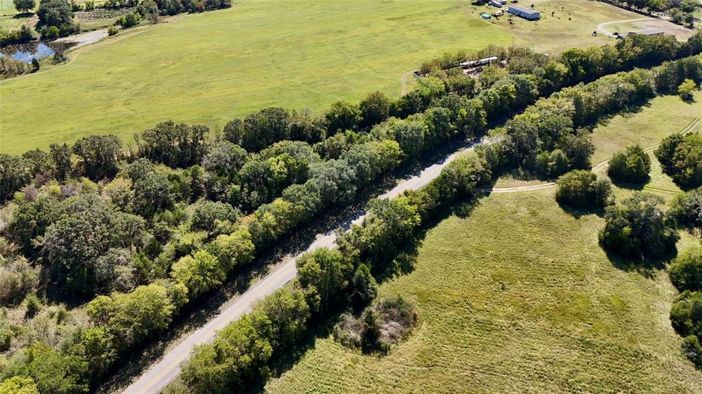 11532 Fm 1651 Canton, TX 75103 - Photo 18 of 21 a view of a lake with a houses