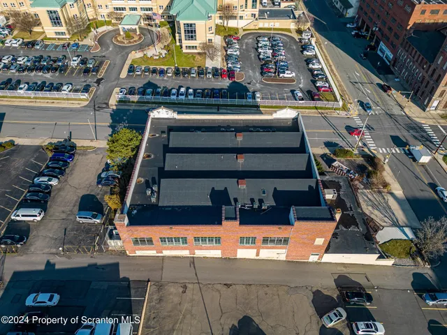 a utility room with a table and chairs