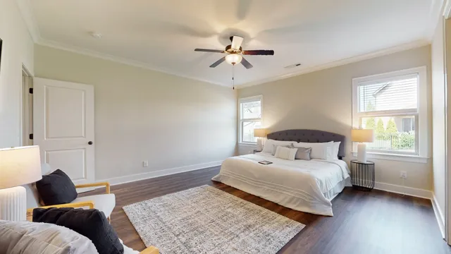 a bathroom with a granite countertop sink a mirror and a window