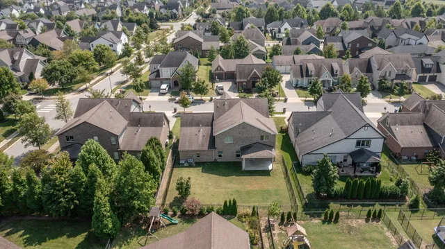a front view of a building with garden