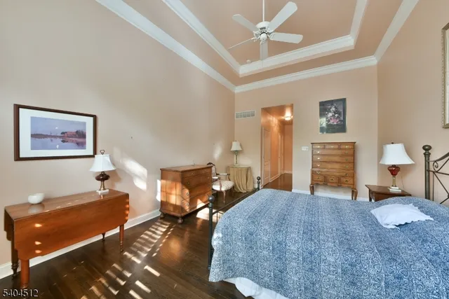 a living room with furniture and a lamp