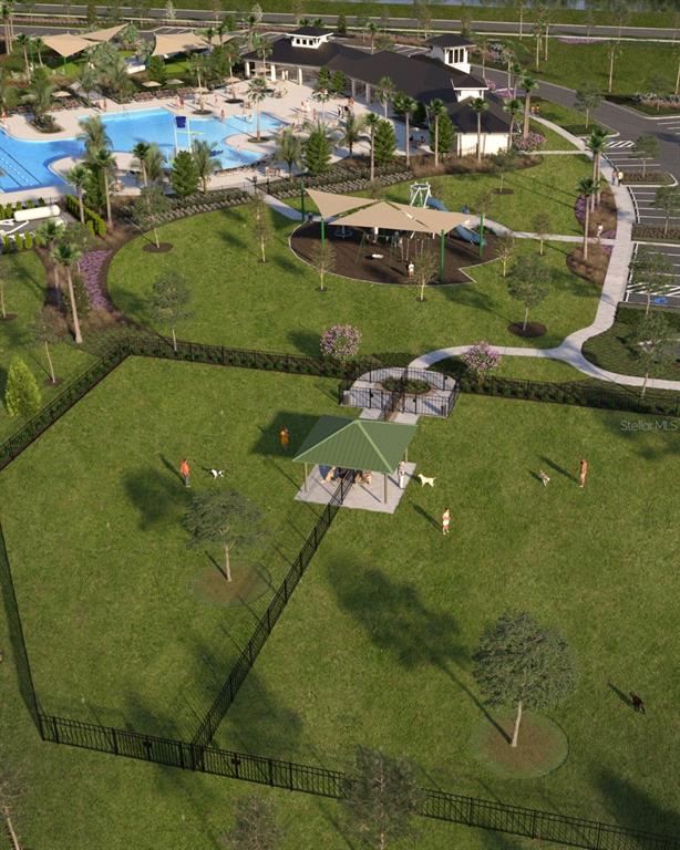34706 Blossom Fall Path Dade City, FL 33525 - Photo 27 of 27 an aerial view of residential houses with outdoor space