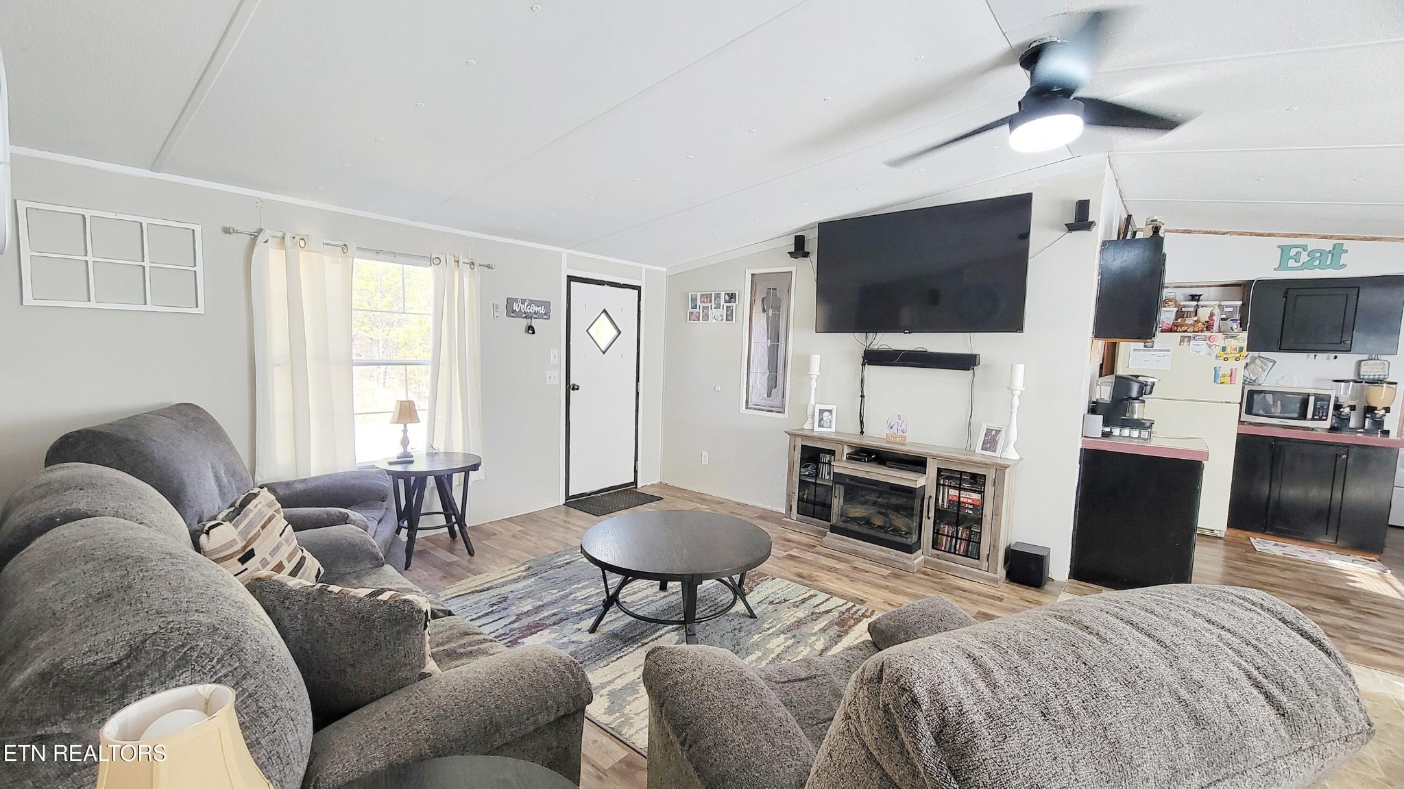 1290 Bluets Road Newport, TN 37821 - Photo 11 of 34 a living room with furniture and a flat screen tv