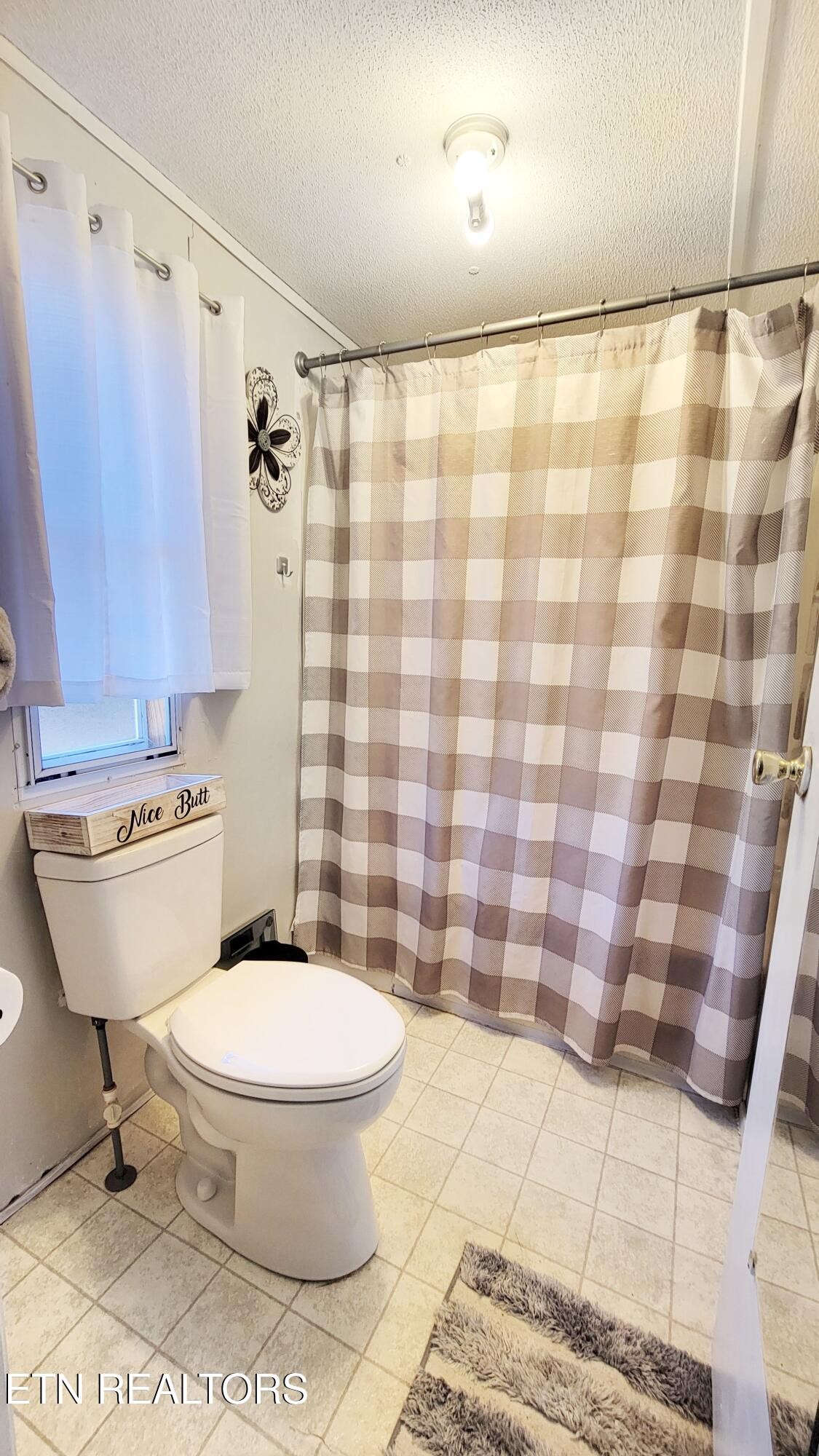 1290 Bluets Road Newport, TN 37821 - Photo 22 of 34 a bathroom with a toilet and a shower