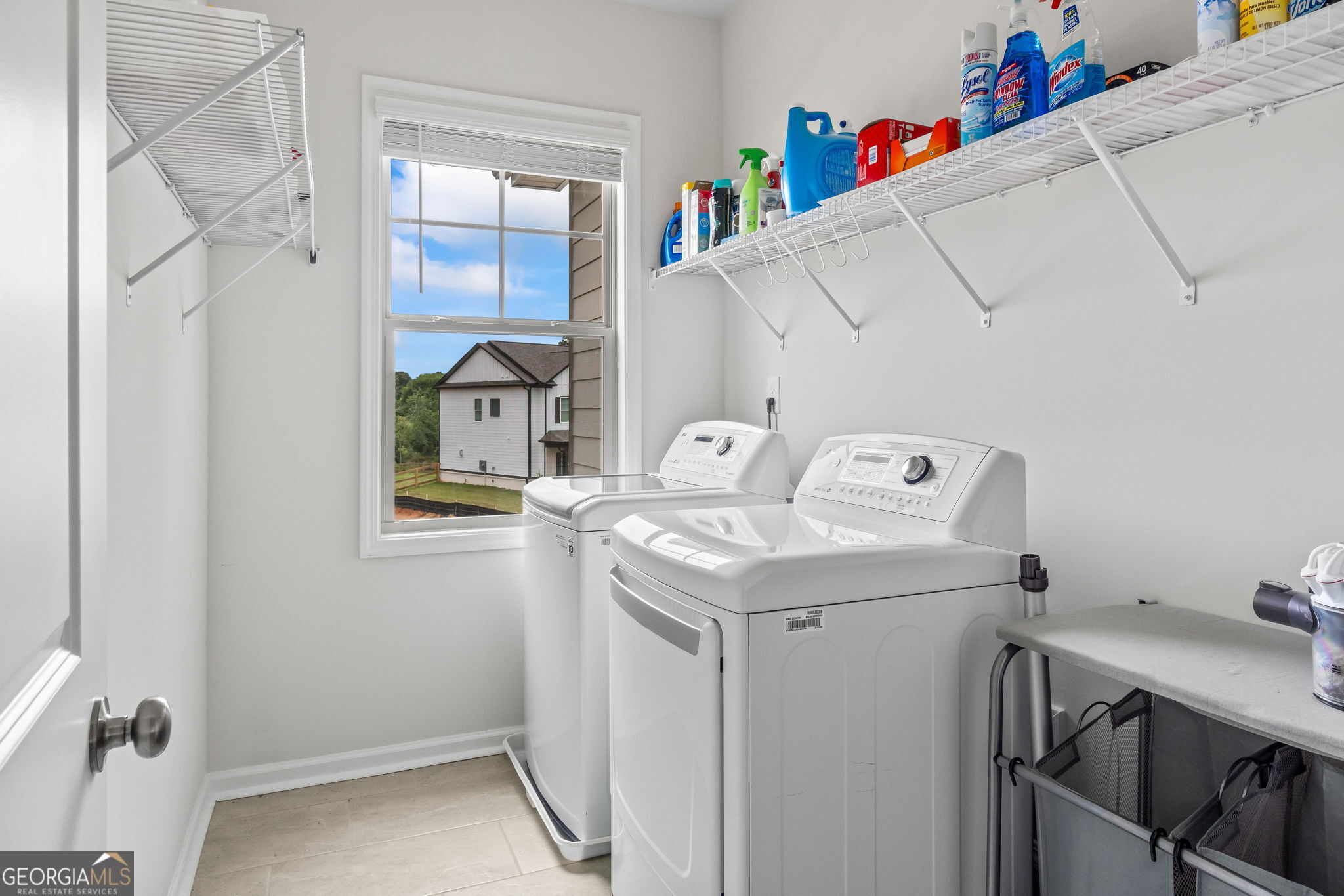 2884 Porches Lane Dacula, GA 30019 - Photo 26 of 41 a utility room with dryer and washer
