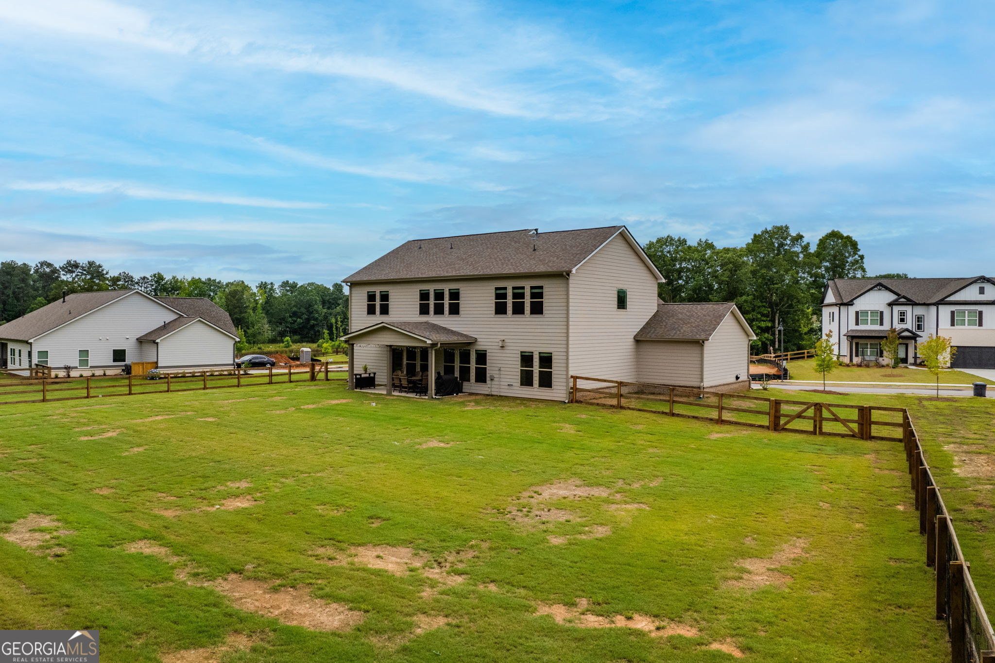 2884 Porches Lane Dacula, GA 30019 - Photo 39 of 41 a front view of a house with garden