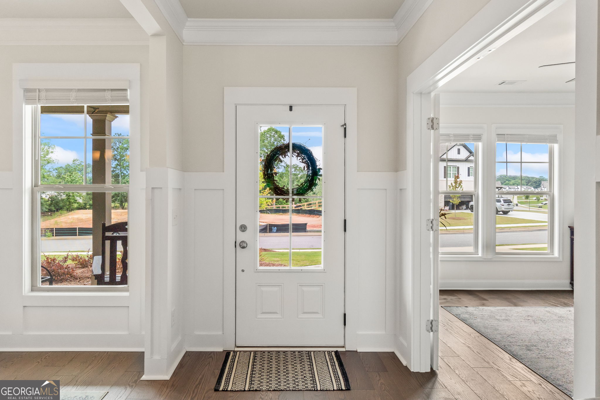 2884 Porches Lane Dacula, GA 30019 - Photo 4 of 41 a view of an entryway with wooden floor and a window