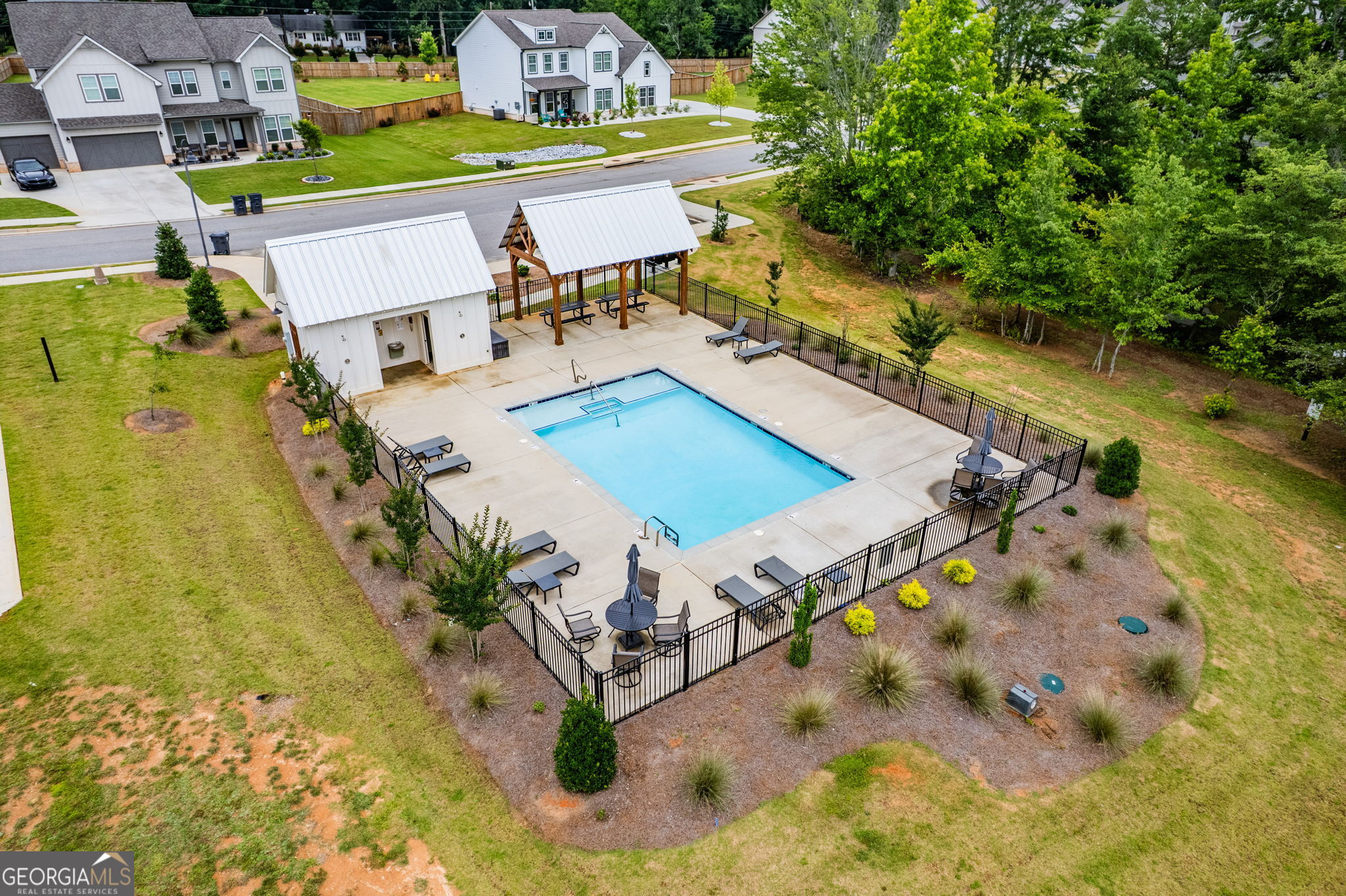 2884 Porches Lane Dacula, GA 30019 - Photo 41 of 41 swimming pool with chairs