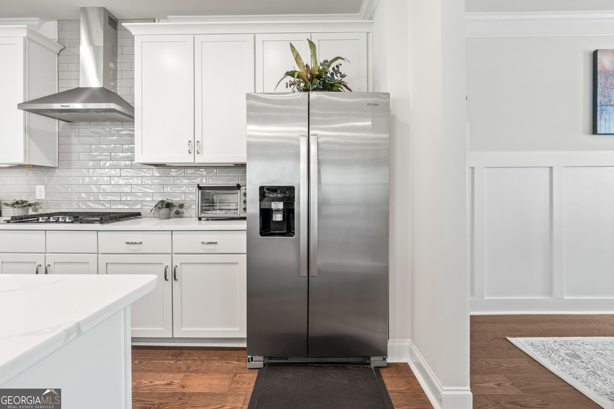 2884 Porches Lane Dacula, GA 30019 - Photo 10 of 41 a kitchen with a refrigerator and a sink