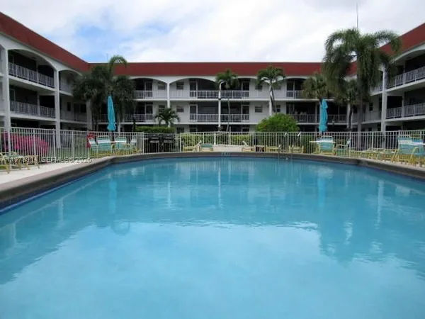 front view of a building with a lake view