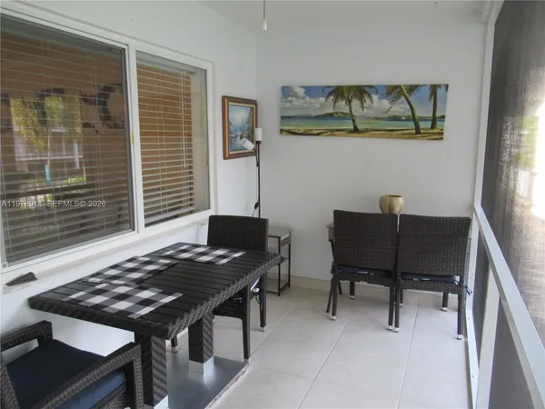 a view of a workspace with furniture