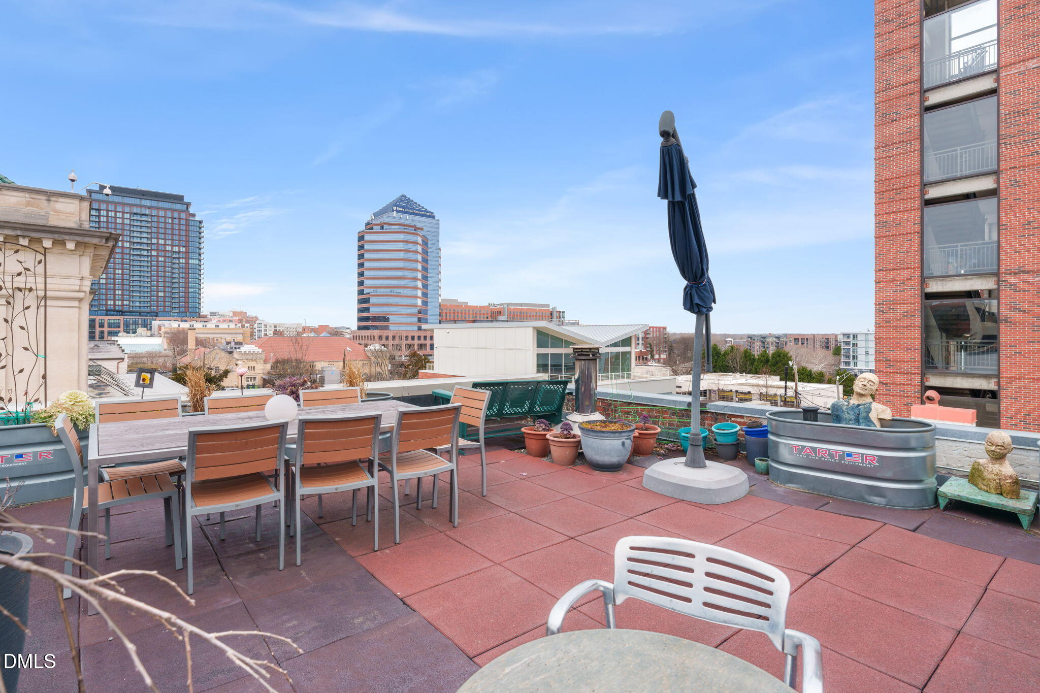 208 Rigsbee Avenue, Unit 206 Durham, NC 27701 - Photo 30 of 36 a view of a terrace with chairs