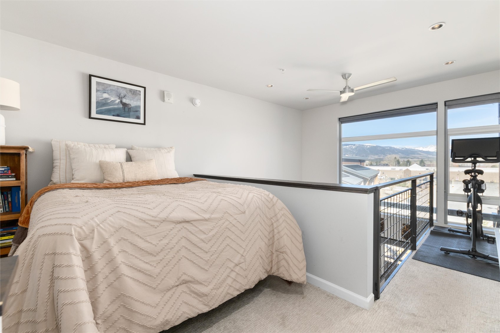 100 Basecamp Way, Unit 215 Frisco, CO 80443 - Photo 8 of 26 Start and end each day with panoramic views of alpenglow on the Continental Divide from the lofted bedroom.