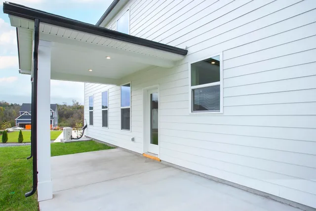 a view of an entryway with a door