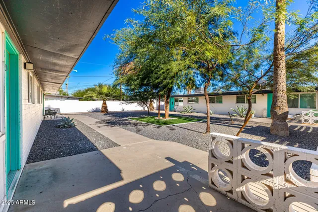 a view of yard with patio