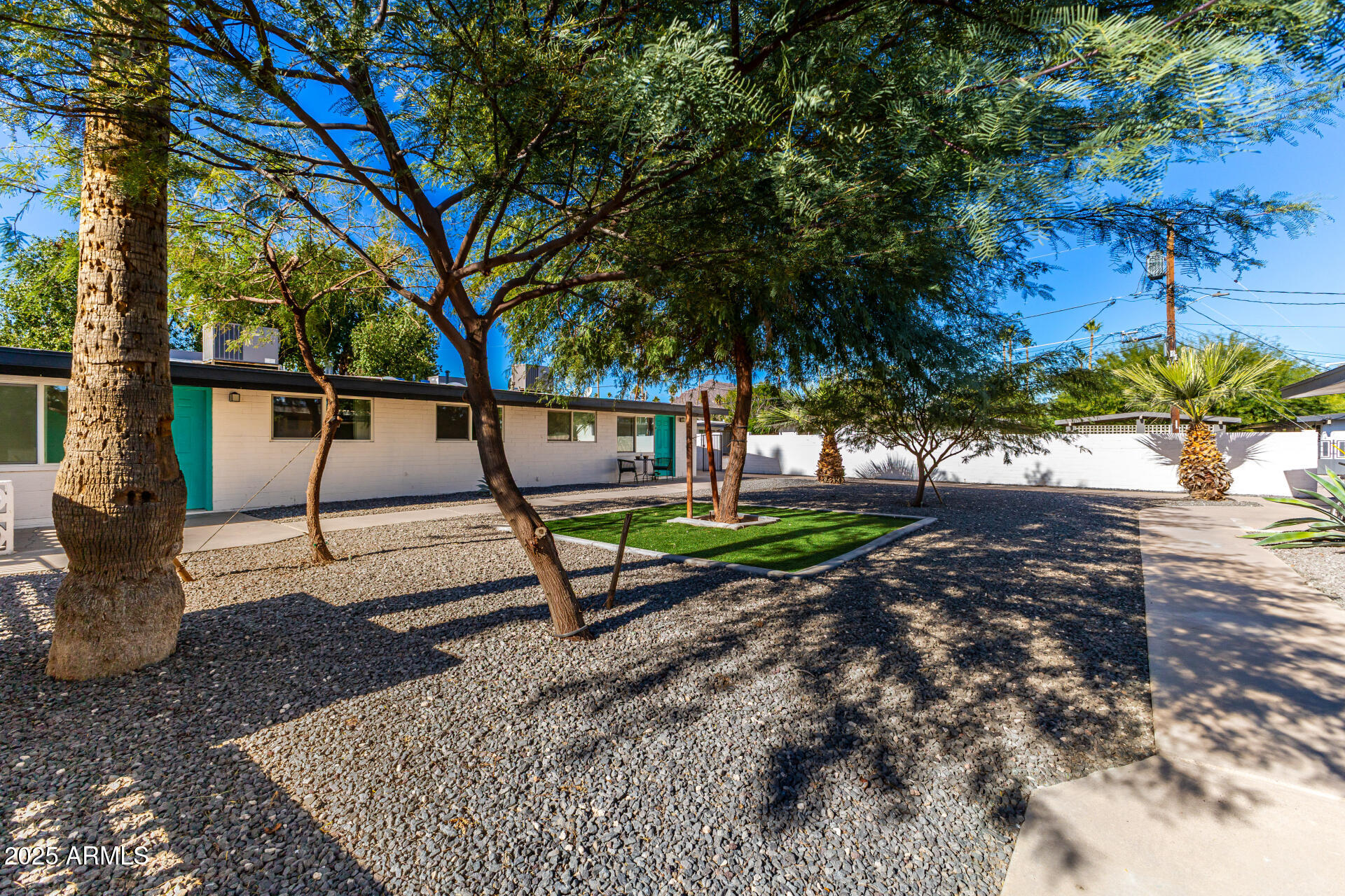 6708 East Cheery Lynn Road, Unit B Scottsdale, AZ 85251 - Photo 34 of 35 a park view with a bench and trees