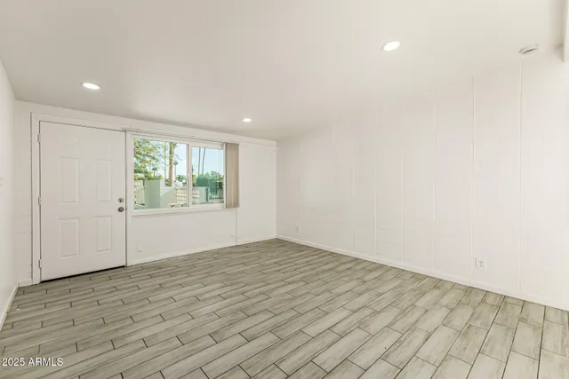 an empty room with windows