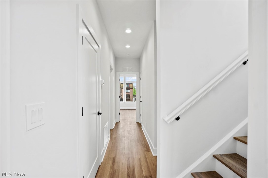 2291 West 19th Street Cleveland, OH 44113 - Photo 18 of 47 Corridor with light hardwood / wood-style floors