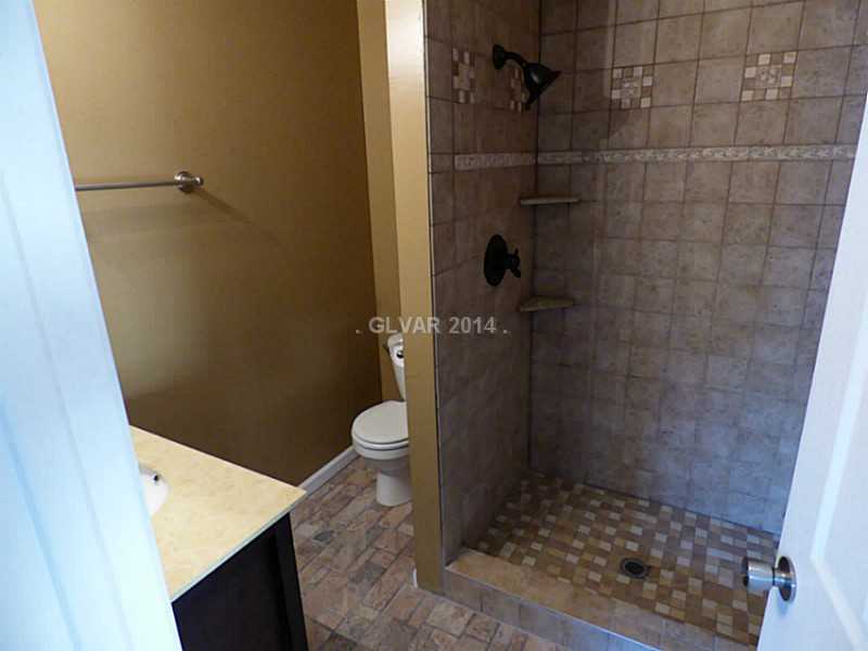 2320 Thoroughbred Road Henderson, NV 89002 - Photo 16 of 34 Property Photo. First Floor Tile 3/4 bathroom