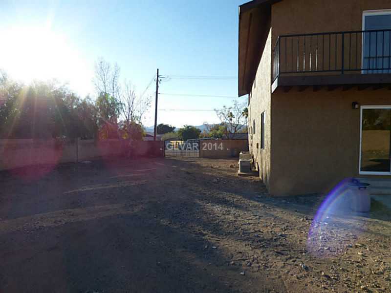 2320 Thoroughbred Road Henderson, NV 89002 - Photo 32 of 34 Property Photo. Huge Side Yard with Custom Wrought Iron Gate, RV, Boats, Horses