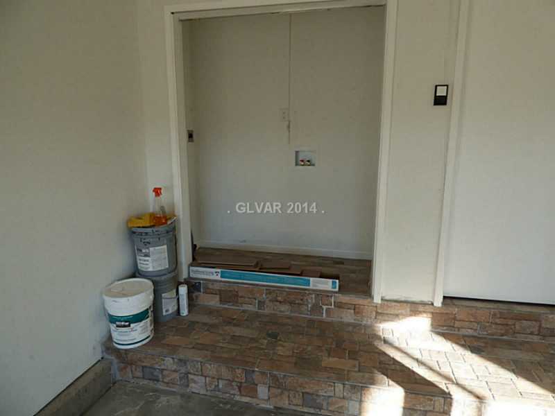 2320 Thoroughbred Road Henderson, NV 89002 - Photo 34 of 34 Property Photo. Laundry deck in 2 car garage front with dual new openers. Extra touch up paint and flooring.