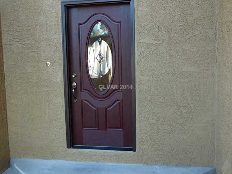 2320 Thoroughbred Road Henderson, NV 89002 - Photo 4 of 34 Property Photo. Custom Front Door with insert