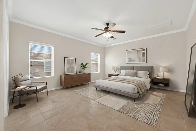 a view of a big room with wooden floor and windows