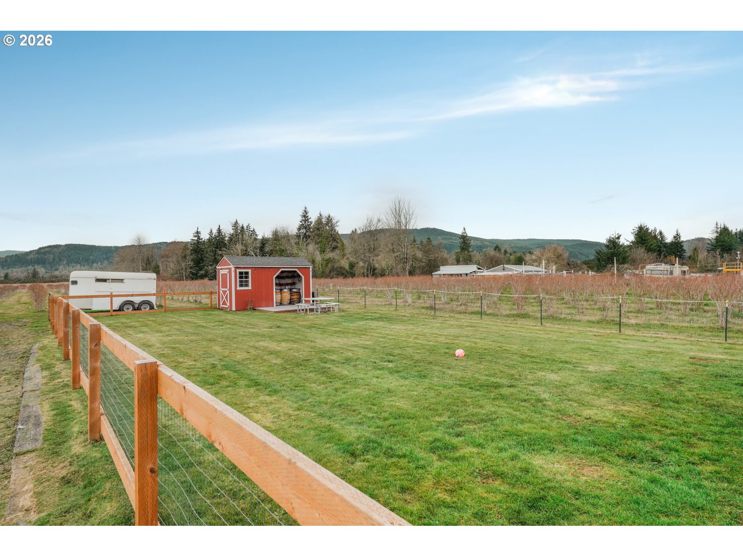 156 Damron Road Mossyrock, WA 98564 - Photo 4 of 34 a view of a big yard with an ocean view