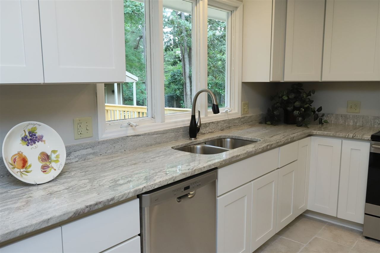 4101 Stranaver Place Raleigh, NC 27612 - Photo 11 of 27 Extensive counterspace for the cook who likes to entertain or just for family. Kitchen
