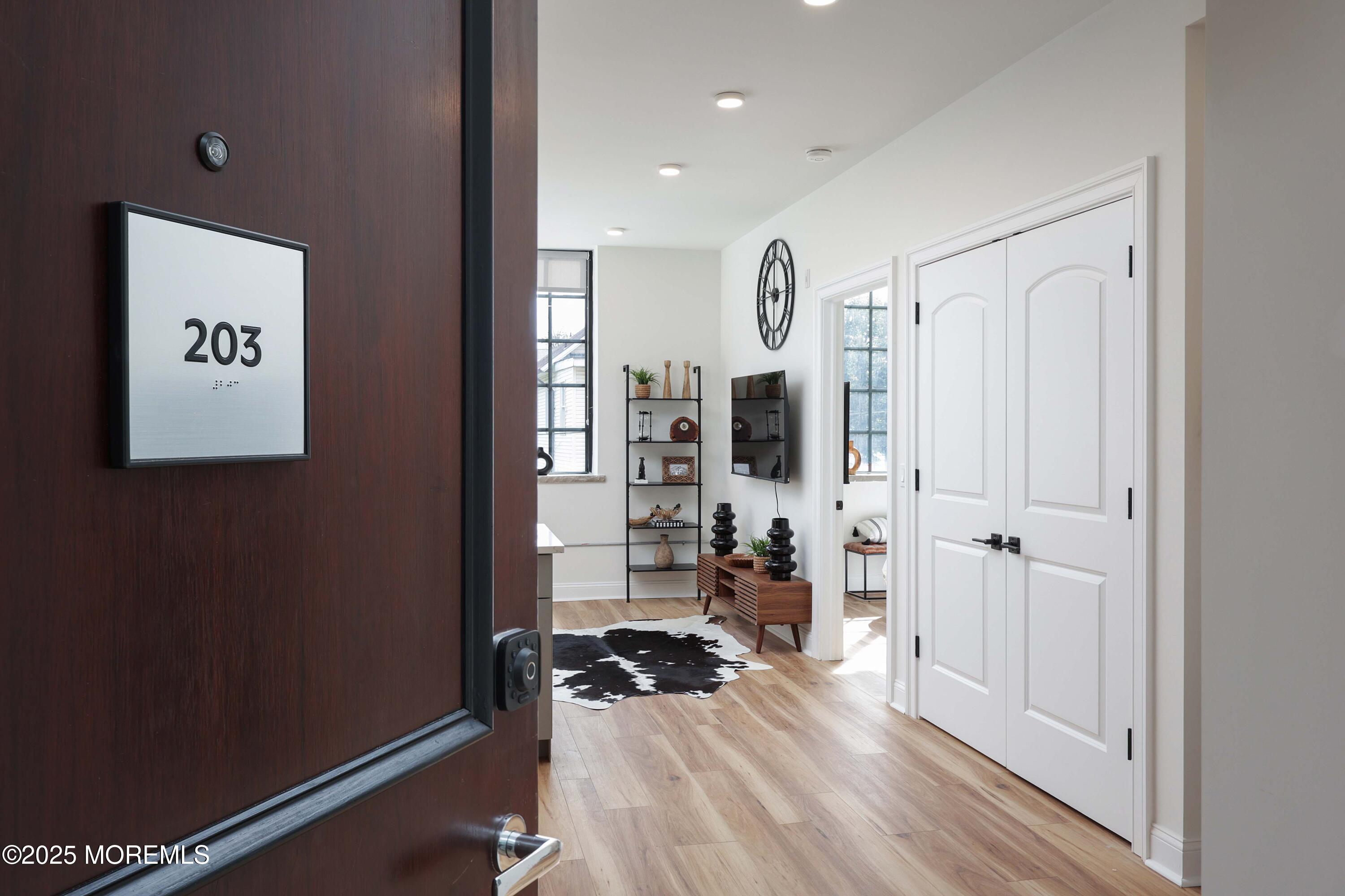 179 Chelsea Avenue, Unit 203 Long Branch, NJ 07740 - Photo 2 of 14 a view of a room with gym equipment