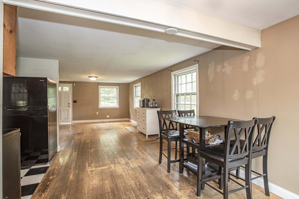 175 Summer Street Norwell, MA 02061 - Photo 11 of 29 a view of a dining room with furniture and window