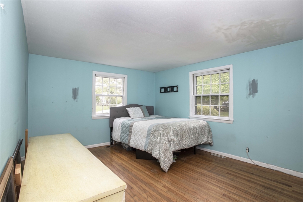 175 Summer Street Norwell, MA 02061 - Photo 15 of 29 a bedroom with a bed and a window