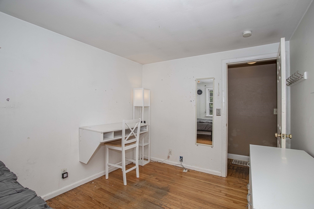 175 Summer Street Norwell, MA 02061 - Photo 18 of 29 a room with furniture and wooden floor