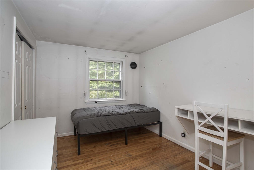 175 Summer Street Norwell, MA 02061 - Photo 19 of 29 a bedroom with a bed and a window